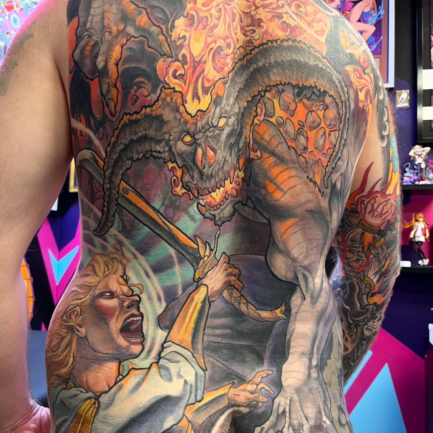 Epic Balrog vs Gandalf back piece illustrative tattoo